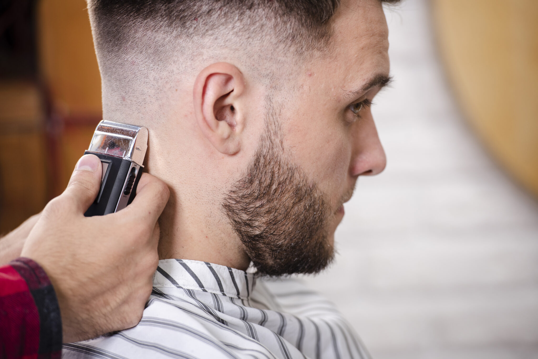 close-up-barber-finishing-haircut