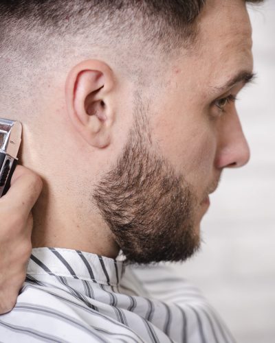 close-up-barber-finishing-haircut